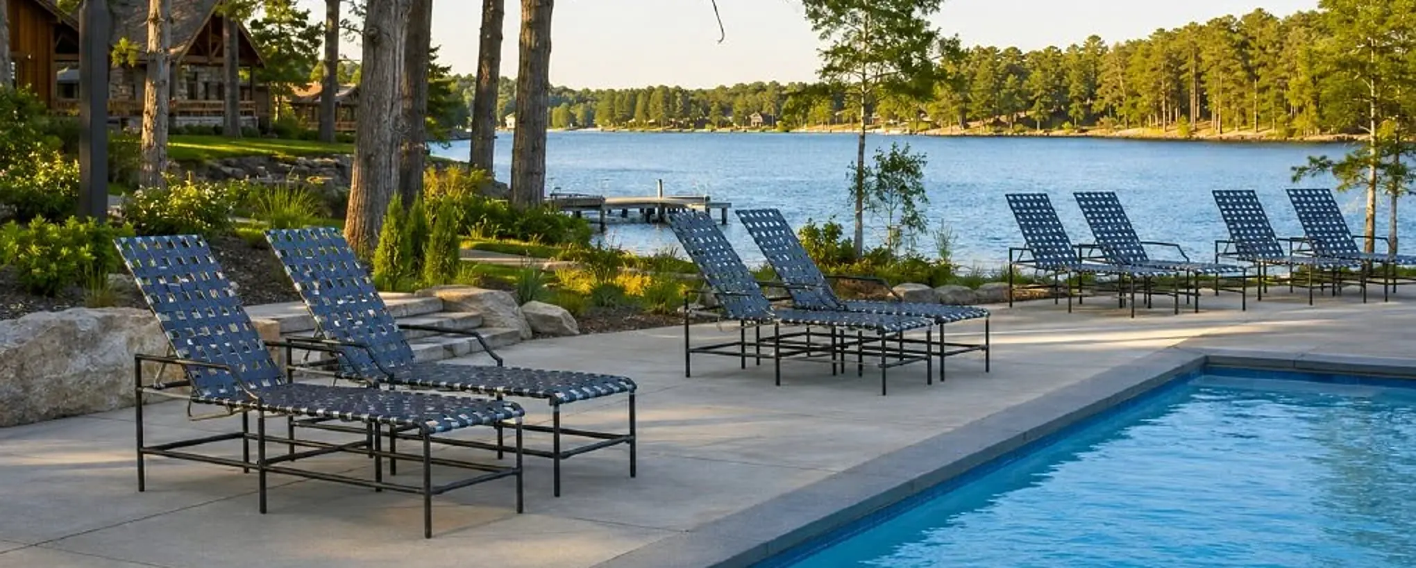 Brio cross-strap chaise lounges in the approved Cievaro lakeside recreation setting