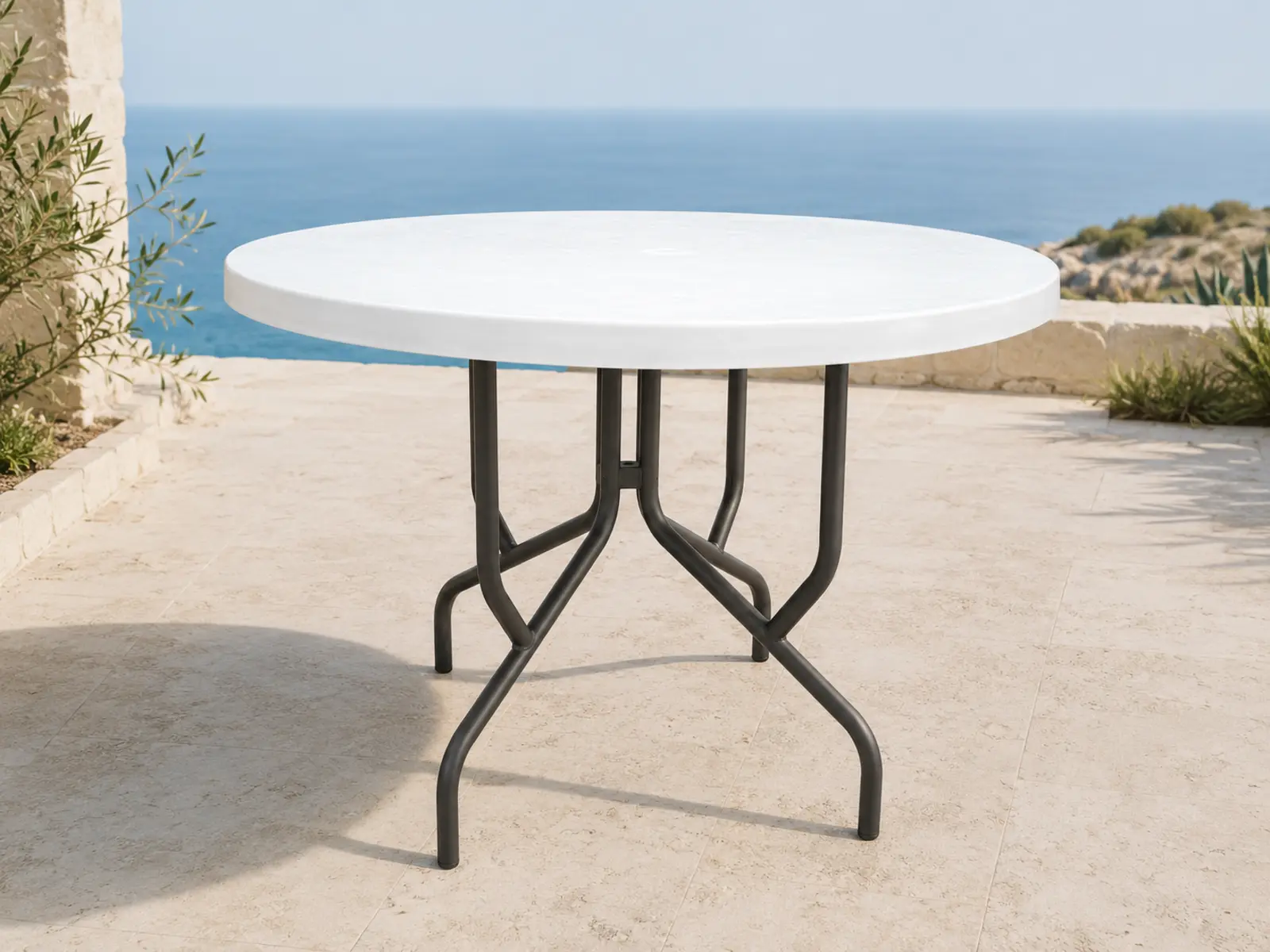 Tavola Pranzo 42 Braced Dining Table shown in a refined outdoor setting