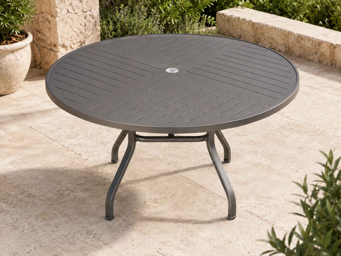 Tavola Pranzo E48 Punch Dining Table shown in a refined outdoor setting