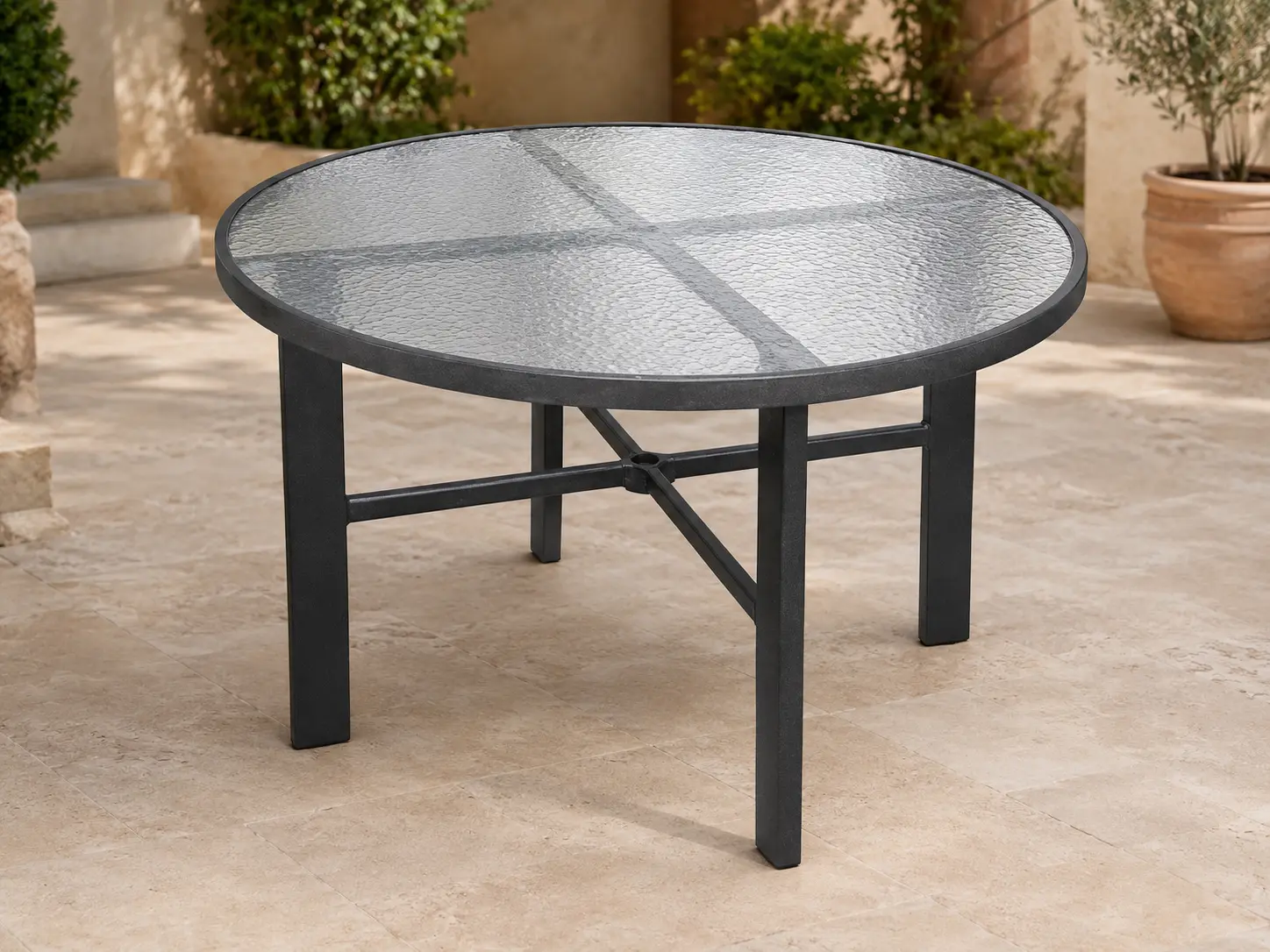 Tavola Pranzo 48 Heavy-Duty Table shown in a refined outdoor setting