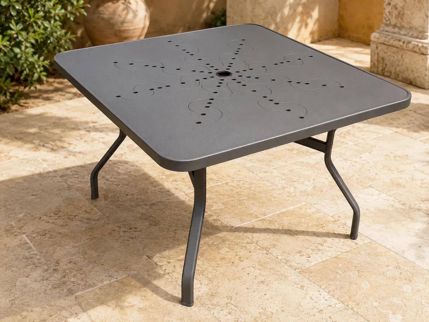 Tavola Pranzo Square Punch Table shown in a refined outdoor setting