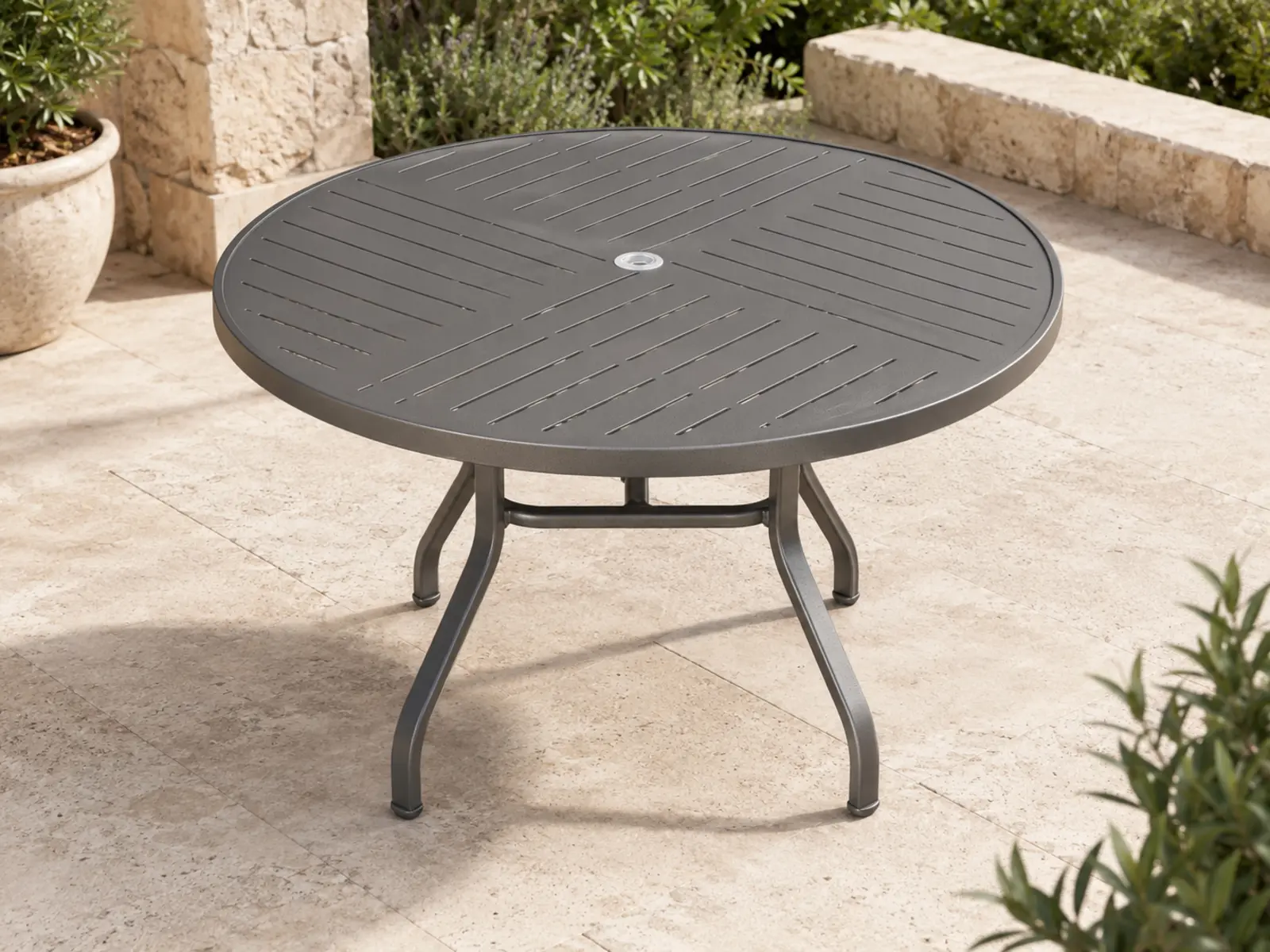 Tavola Pranzo 42 Punch Dining Table shown in a refined outdoor setting