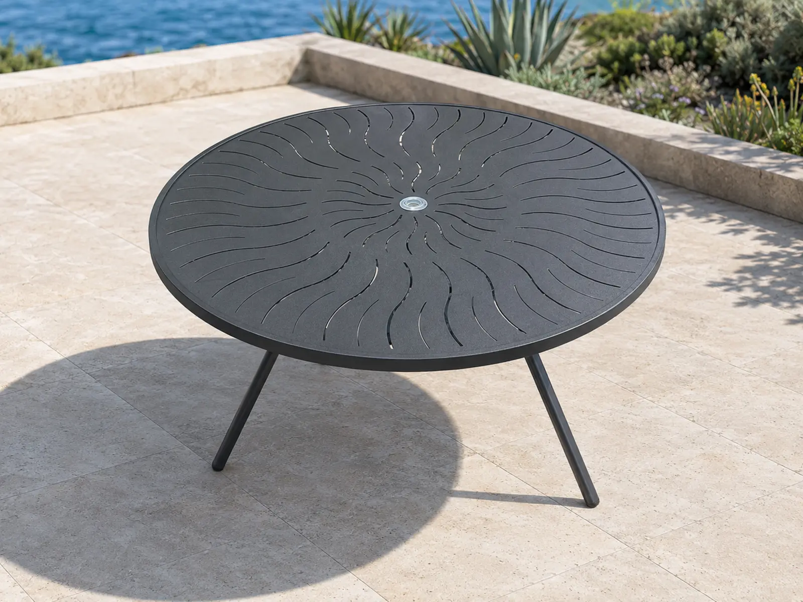 Tavola Pranzo 48 Punch Dining Table shown in a refined outdoor setting